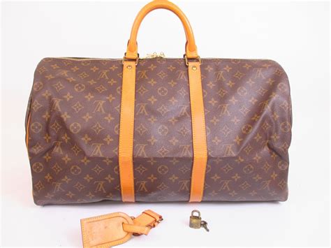 used louis vuitton duffle|louis vuitton duffle bag brown.